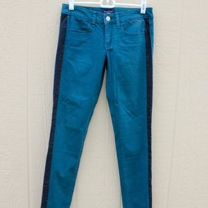 emerald green jeans with black stripe